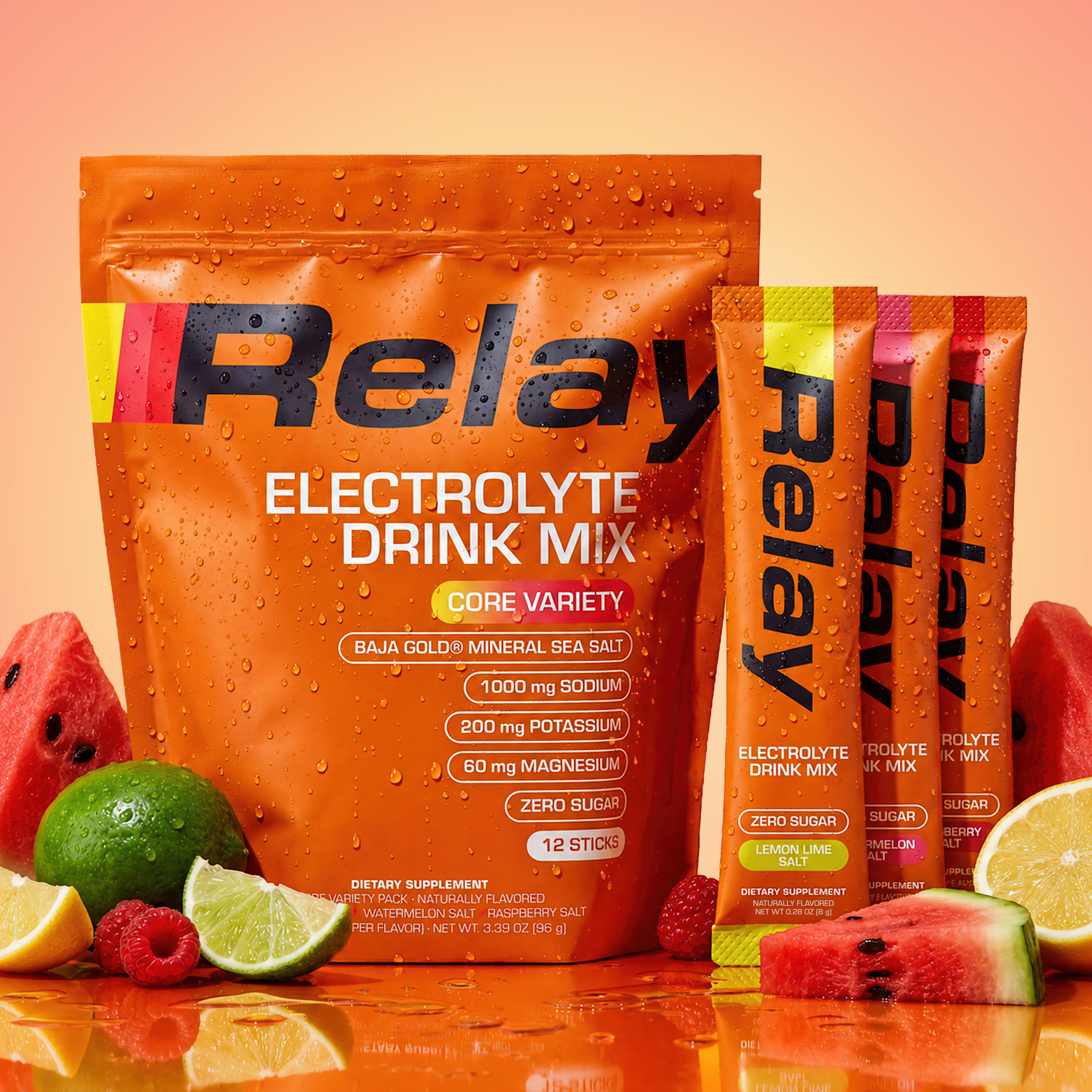 variant:49283815145709 Orange Relay Electrolyte Drink Mix package with sticks on a peach background